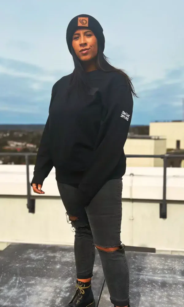 Woman Standing front on wearing the DROW AJ Stealth Sweatshirt